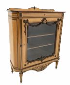 Late 19th century Regency design satinwood glazed cabinet the raised and floral carved back over ros