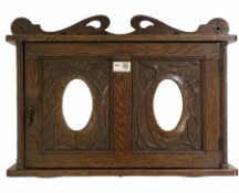 Early 20th century art nouveau period oak wall hanging cabinet
