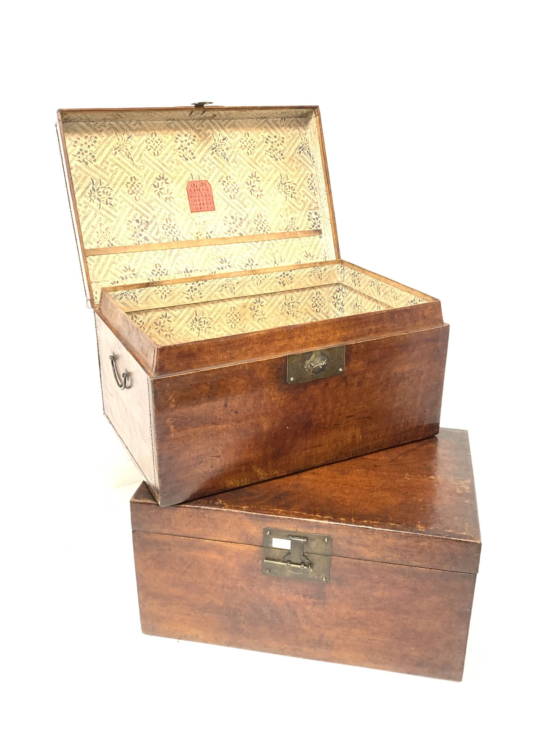 Pair of Chinese design leather covered storage trunks