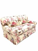 Wesley-Barrell two seat sofa upholstered in floral fabric with feather cushions