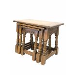 Early 20th century oak nest of three tables