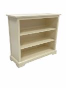 White painted three tier open bookcase with fixed shelves