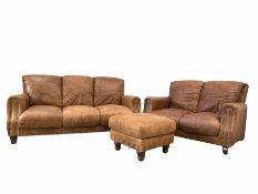 Traditional brown leather upholstered in studded tan leather