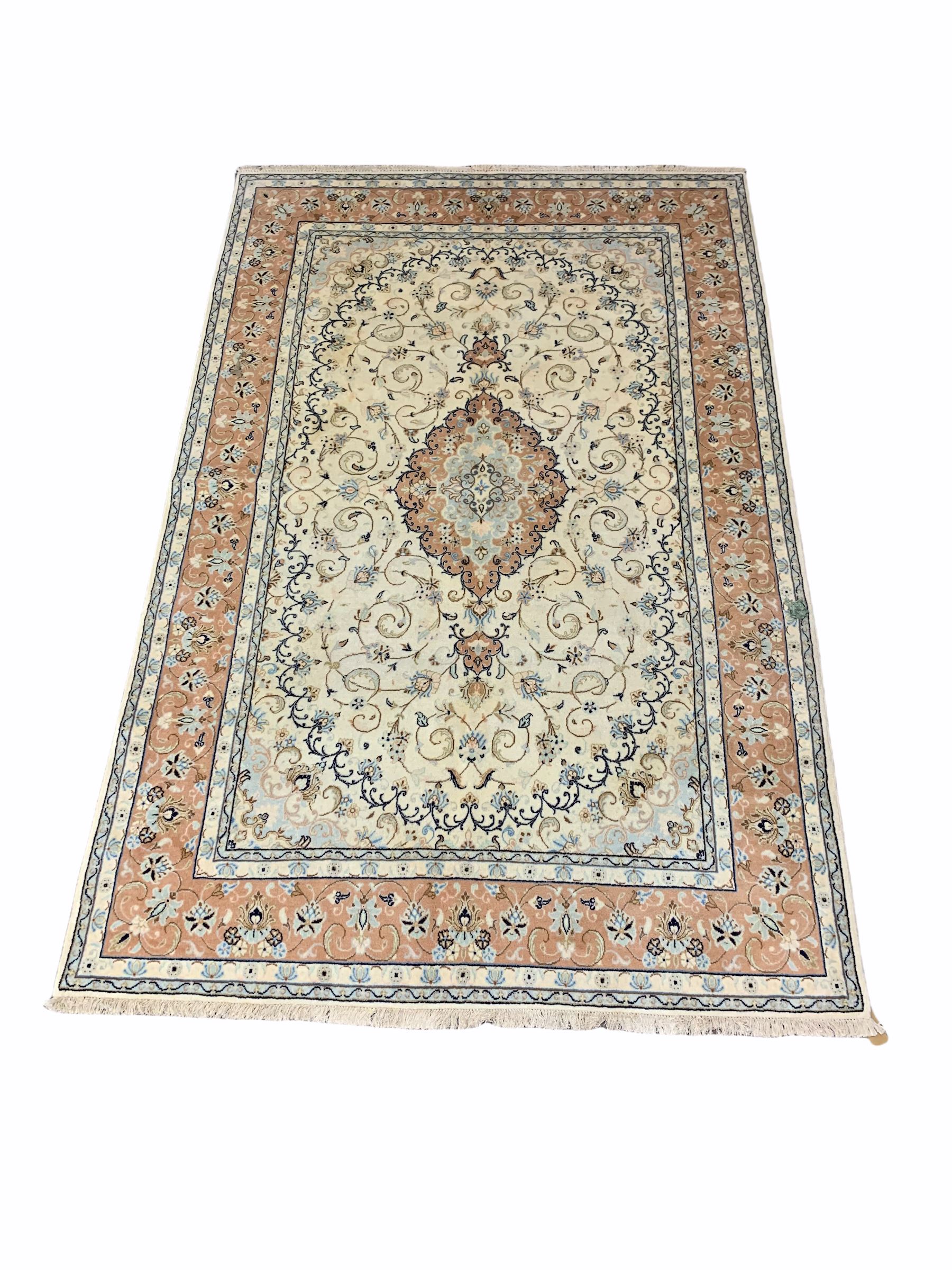 Persian Meshad hand knotted ivory ground carpet