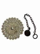 Cast iron ceiling rose of concentric floral design together with a ball and chain