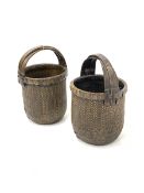 Pair of cane work baskets of cylindrical form with bentwood carry handles H62cm