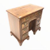 20th century Queen Anne style walnut knee hole desk