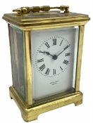 An early 20th century eight-day French Corniche cased timepiece carriage clock with a platform cylin