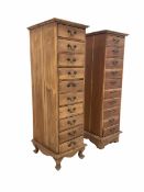 Two 20th century hardwood tall chests fitted with ten drawers