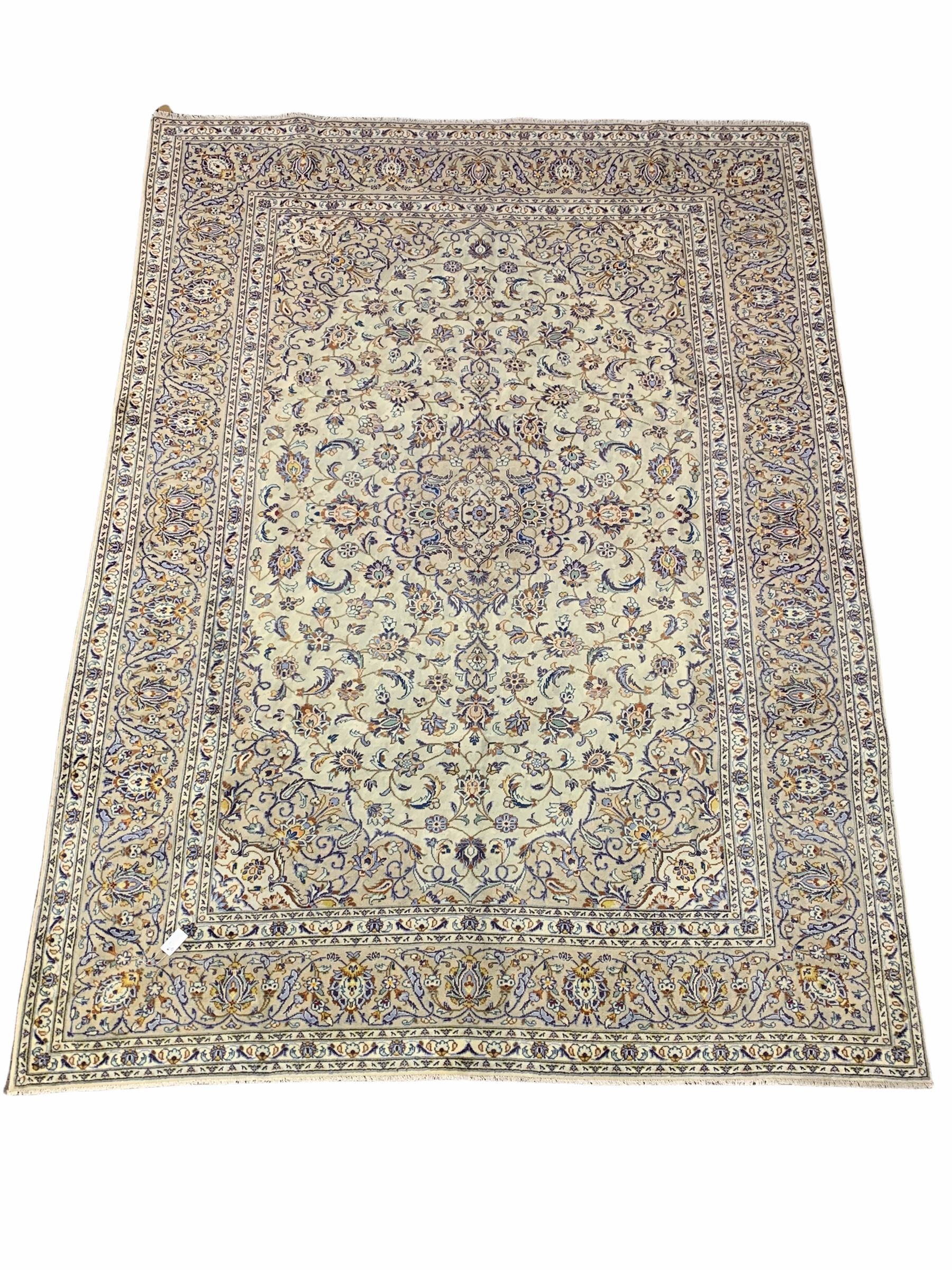 Persian Kashan hand knotted ivory ground carpet