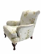 Late 19th / Early 20th century armchair upholstered in floral fabric