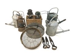 Three vintage galvanised metal watering cans