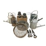 Three vintage galvanised metal watering cans