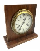 20th century circular brass cased clock with a twin train spring driven movement in the style of a b