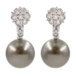 Pair of 18ct white gold diamond flower head cluster stud earrings