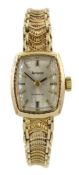 Accurist gold ladies manual wind wristwatch on gold bracelet