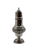Silver vase shape sugar castor embossed with scrolls and on a short pedestal foot H20cm Birmingham 1