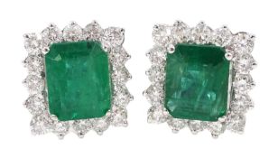 Pair of 18ct white gold emerald and round brilliant cut diamond cluster stud earrings