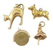 Four 9ct gold charms including corgi