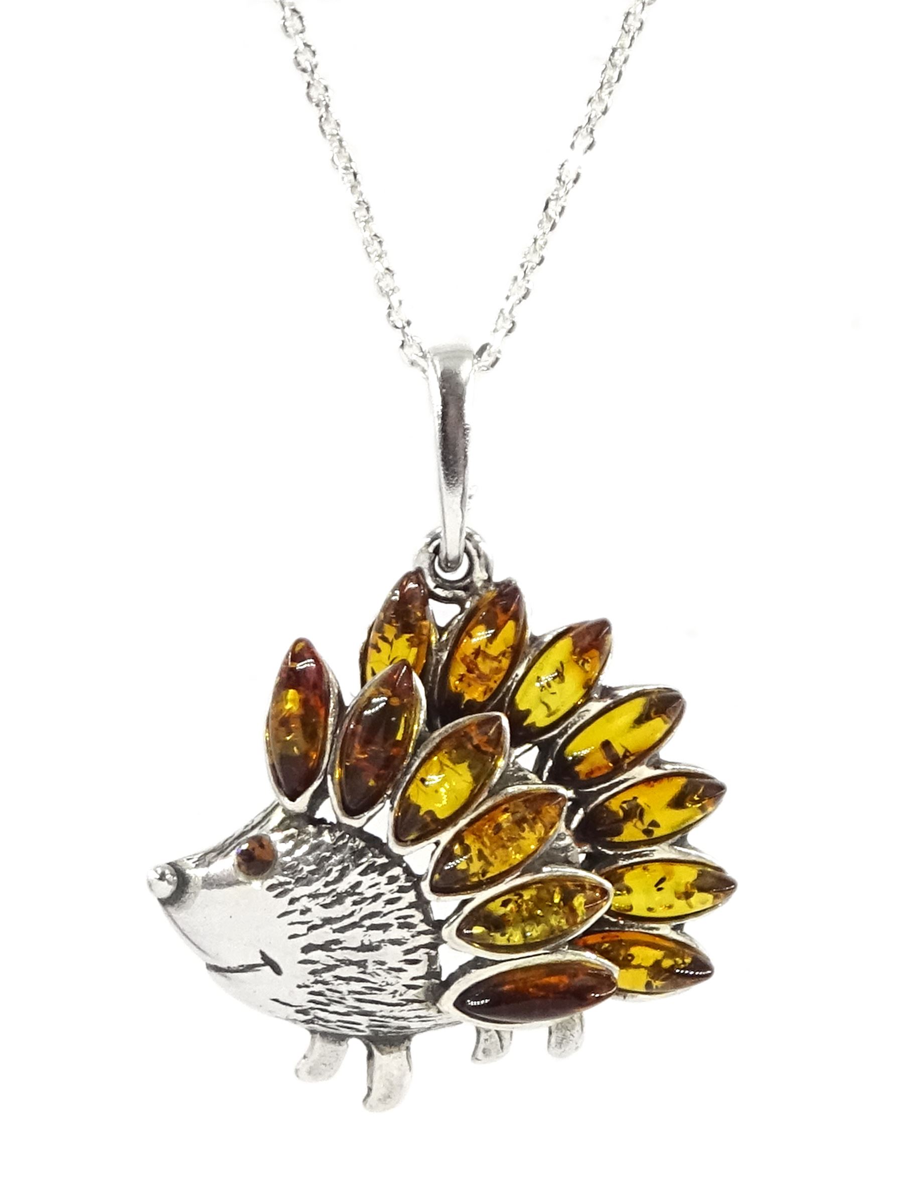 Silver Baltic amber hedgehog pendant necklace