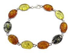 Silver oval Baltic amber link bracelet