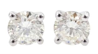 Pair of 18ct white gold round brilliant cut diamond stud earrings