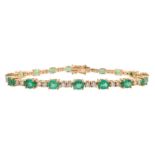 18ct rose gold oval emerald and round brilliant cut diamond bracelet