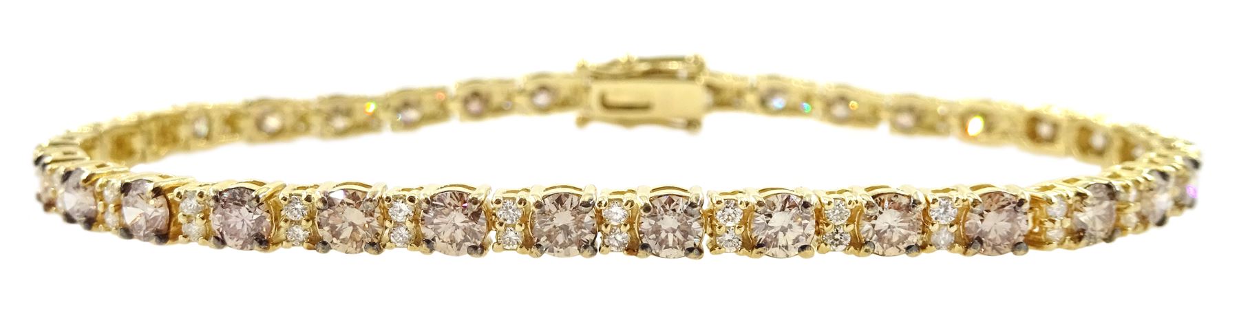 Gold round brilliant cut diamond champagne and white diamond bracelet