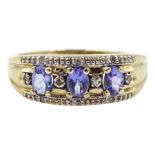 9ct gold three stone oval tanzanite and diamond chip ring