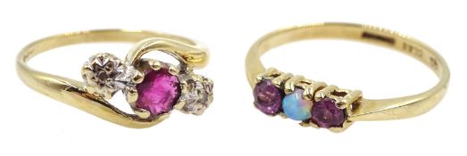 Gold amethyst and opal three stone ring and a gold ruby and diamond three stone ring
