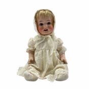 Heubach Koppelsdorf bisque head doll with composition moving ball and socket joints