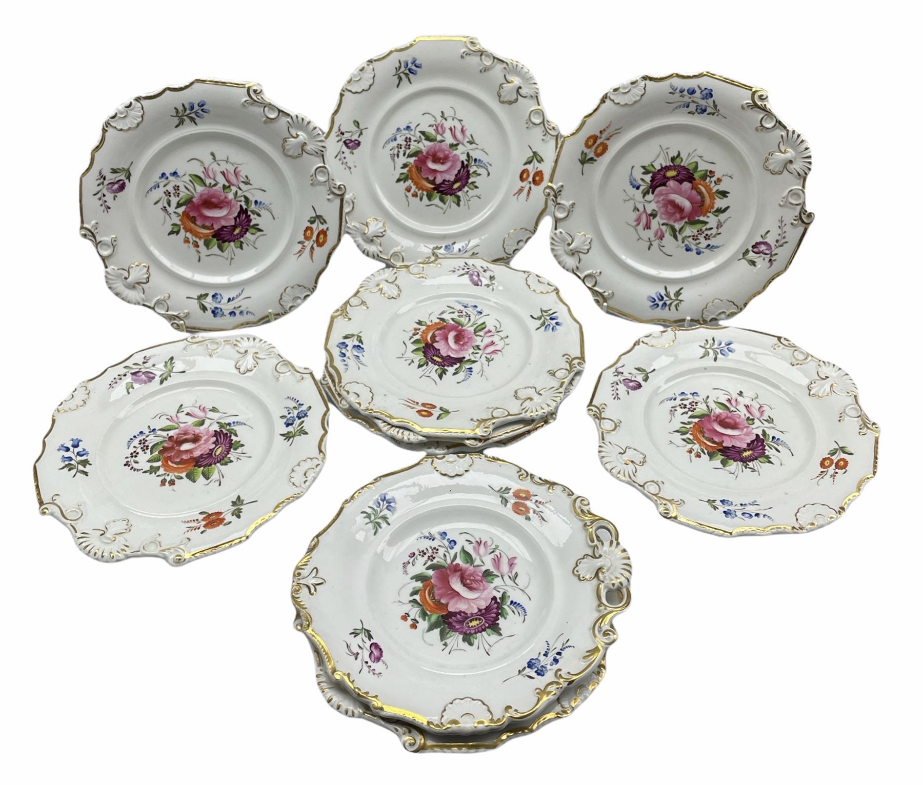 Set of ten Victorian Coalport design dessert plates individually painted with a centre spray of flow