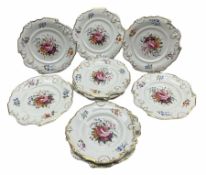 Set of ten Victorian Coalport design dessert plates individually painted with a centre spray of flow