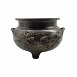 19th century Japanese bronze two handled jardiniere decorated with a raised pattern of dragons etc a