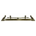 Victorian brass fire fender with reeded and scroll cast corners and matched finials