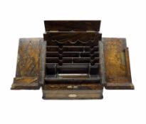 Victorian figured walnut stationery casket enclosed by divided doors