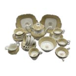 Victorian tea set decorated with a centre panel within a cream and scroll moulded border comprising