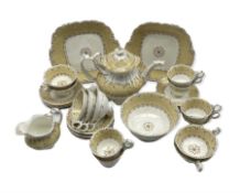 Victorian tea set decorated with a centre panel within a cream and scroll moulded border comprising