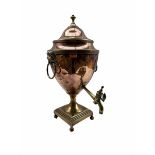 Early 19th century copper tea urn with lion mask ring handles