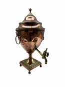 Early 19th century copper tea urn with lion mask ring handles