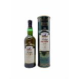 Bottle of Famous Grouse Vintage Malt Whisky 1987 in green metal tube