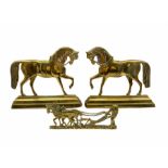 Pair of 19th century brass hearth ornaments in the form of standing horses on a stepped base H23cm a