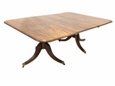 Regency period mahogany twin pillar dining table