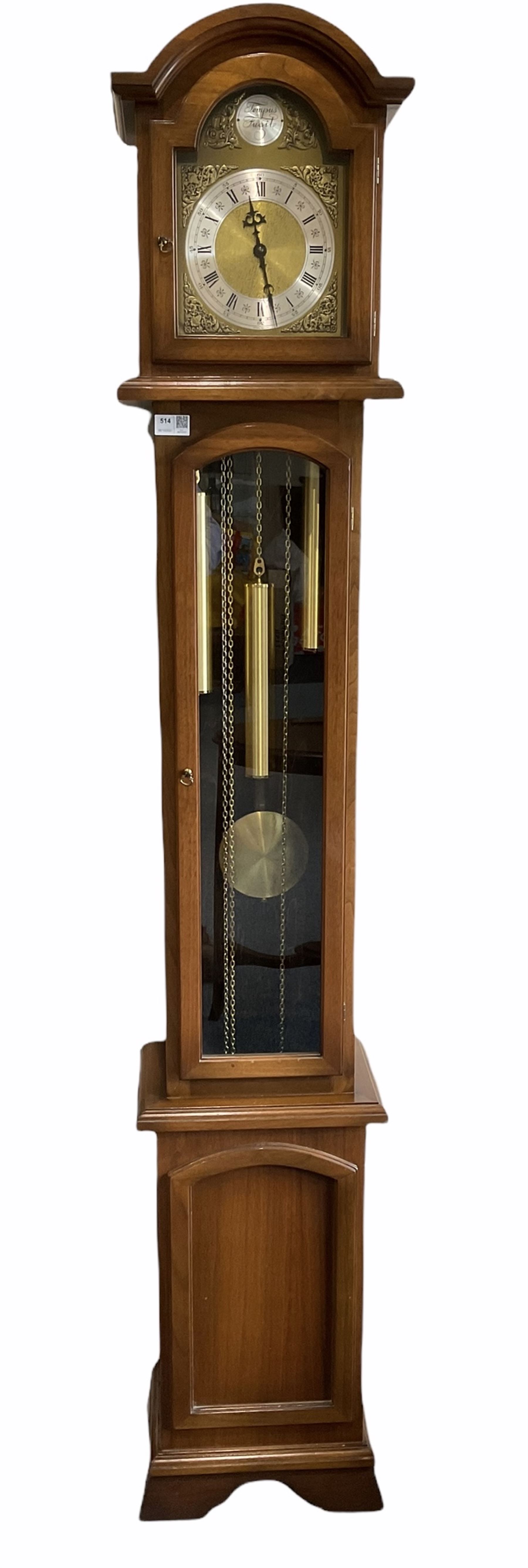 A weight driven 20th century �Grandmother� clock striking the hours and quarters on gong rods