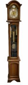 A weight driven 20th century �Grandmother� clock striking the hours and quarters on gong rods