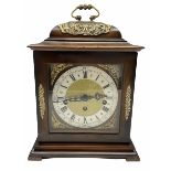 A 20th century three train mantle clock in the style of an 18th century bracket clock