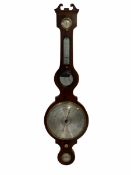 A Victorian mahogany five dial mercury wheel barometer with satinwood stringing to the edge