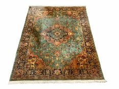 Persian style green ground rug carpet