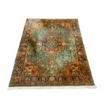 Persian style green ground rug carpet