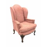 Early 20th century Chippendale style mahogany framed wing back armchair